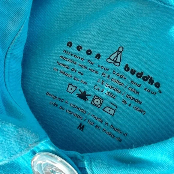 Neon Buddha Blue Sparkly Buttons Tunic
Size Medium - Picture 11 of 13